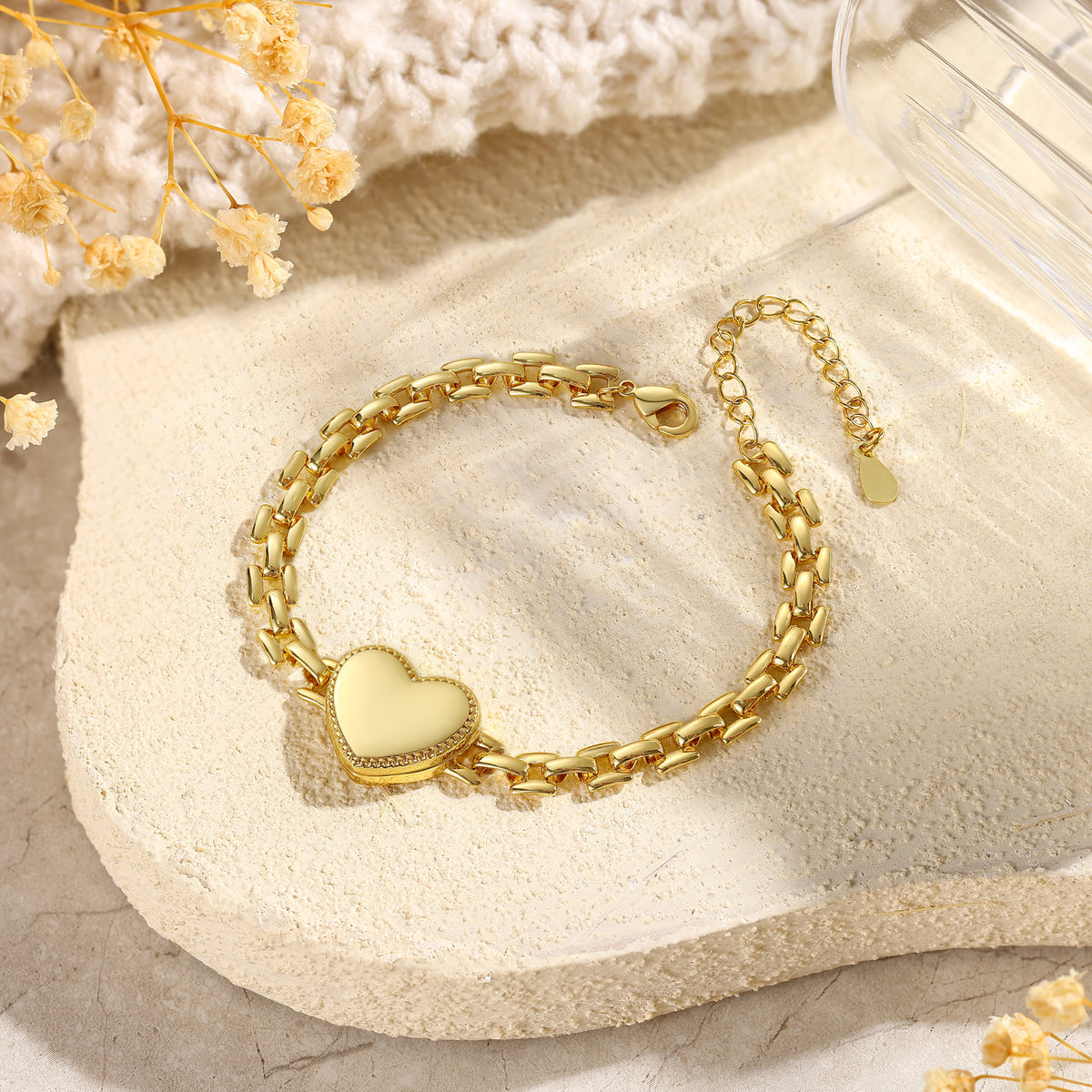 Gold-plated heart bracelet with closed locket and adjustable extension chain