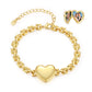 Gold-plated heart locket bracelet on white background showing closed and open photo locket