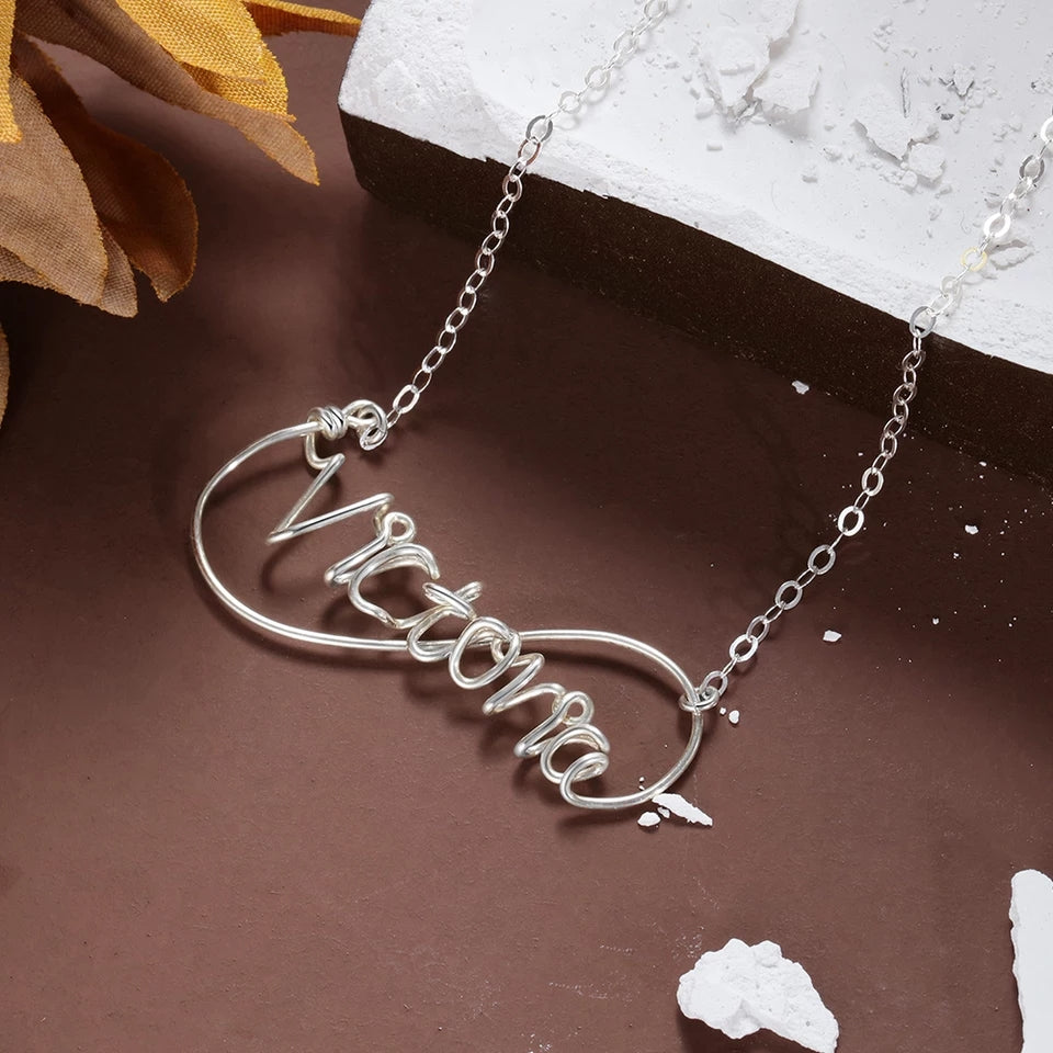 Silver necklace with name deals personalised on it