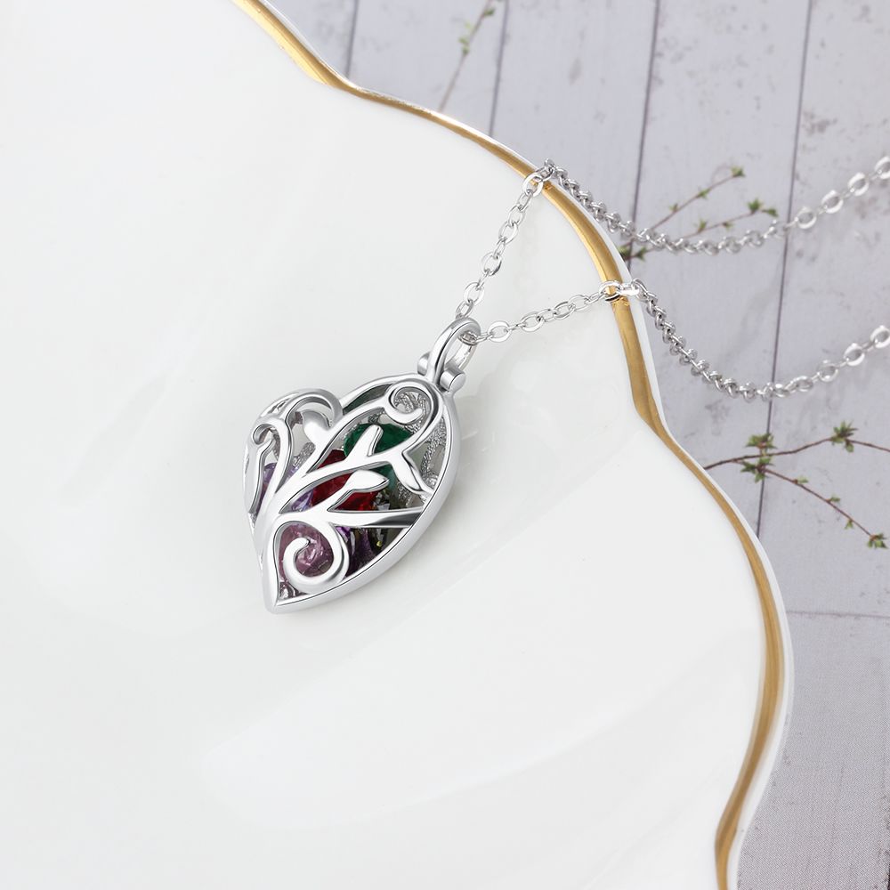 Engraved cage heart pendant with gemstone