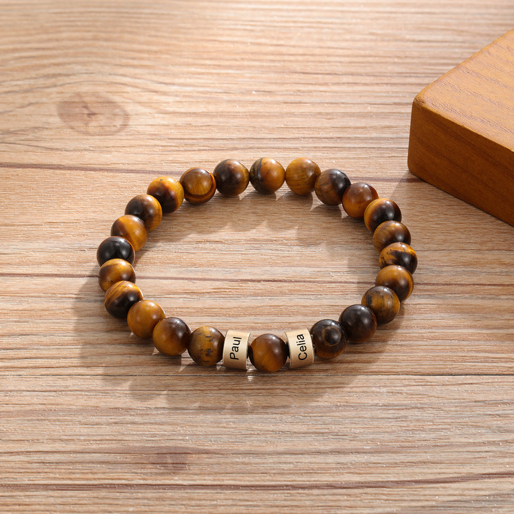Tiger eye beaded men’s bracelet with engraved 2 gold beads. 