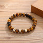  Tiger eye beaded men’s bracelet with engraved 3 gold beads